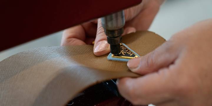 Prada Group says it has purchased fashion rival Versace in a deal worth nearly $1.4 billion