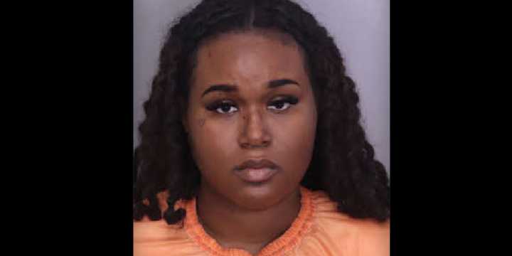 Mother, 26, accused of sexual encounter with 14-year-old boy in car — while her 3 children were present
