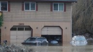 Western Washington crews shift to recovery after historic flooding, with more rain ahead