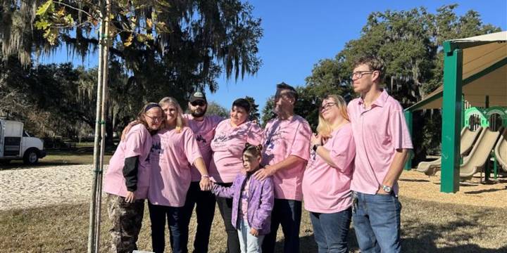 Family, community honor 5-Year-Old Missy Mogle with red oak tree planting