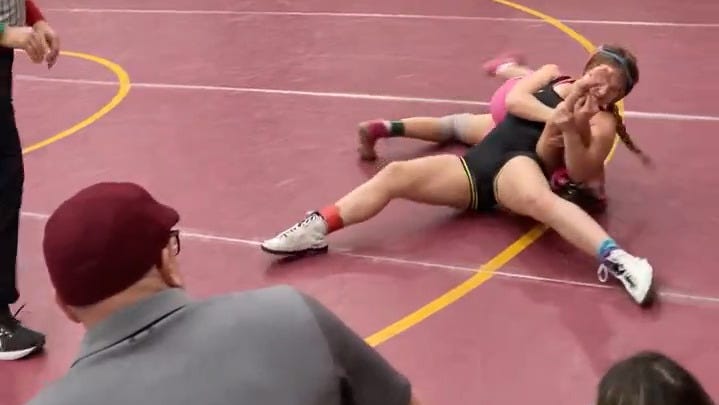 Perry's Carolyn Geckler scores a quick pin at Women of Ironman
