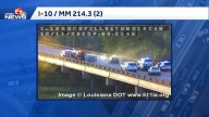 Overturned vehicle on Spillway causing heavy delays on I