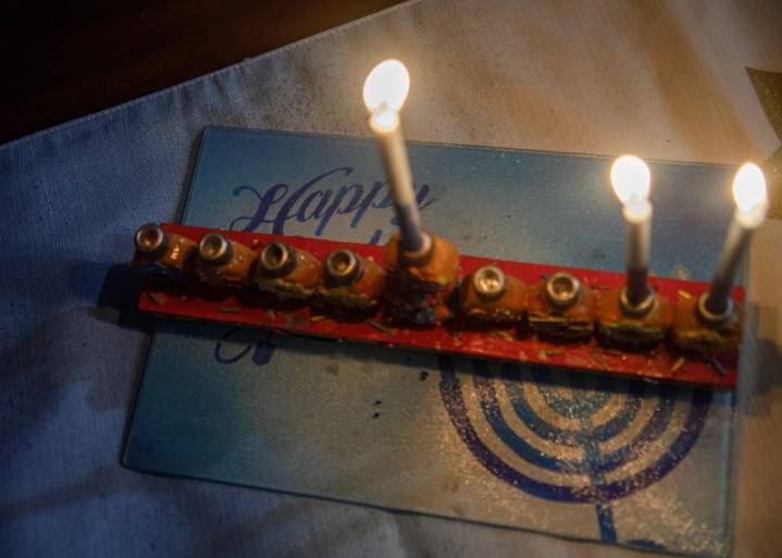 Fight darkness with light at Hanukkah [editorial]
