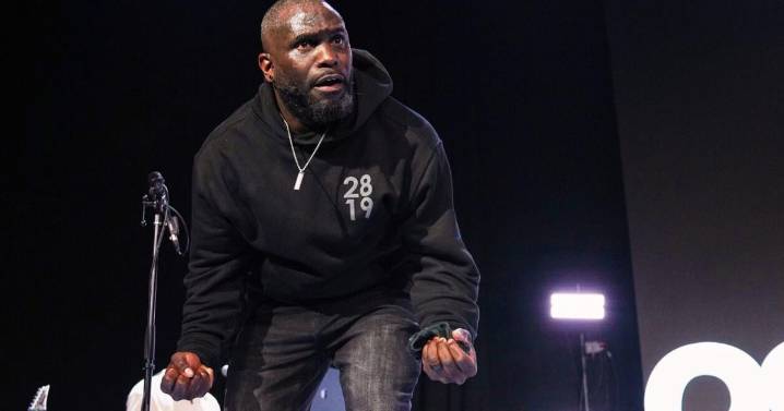 Young adults waiting in line to worship at fast