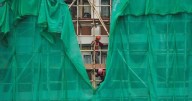 Hong Kong speeds up removal of scaffolding after deadly high rise fire