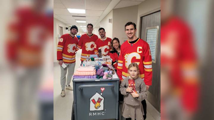Flames players volunteer at Ronald McDonald House