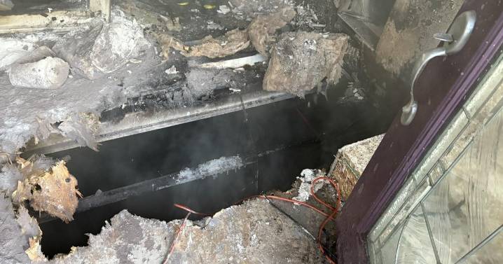 Denver firefighter rescued after falling through the floor during house fire