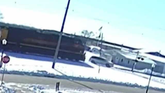Watch: Train slams into car crossing railroad tracks in Iowa