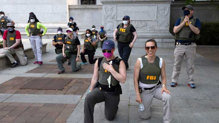 FBI agents sue after being fired for kneeling during racial justice protest