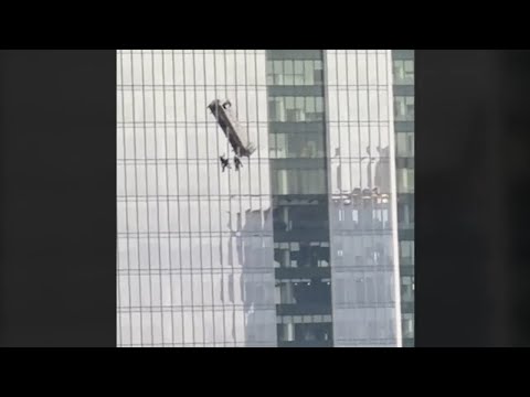 High-rise window washers left dangling after equipment malfunction