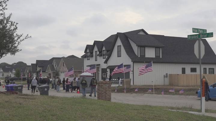 Army veteran and daughters receive keys to mortgage