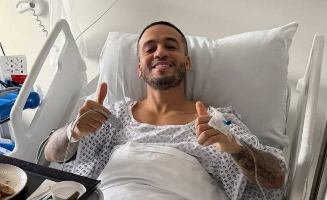 JLS star shares health update with fans from hospital bed after operation