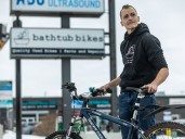 Calgary bike shop owner celebrates new sign after five