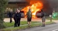 Terror as huge fire erupts at BP petrol station and man seen 'wielding axe'