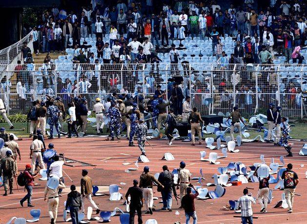 Lionel Messi’s tour of India descends into chaos as fans hurl seats and invade pitch