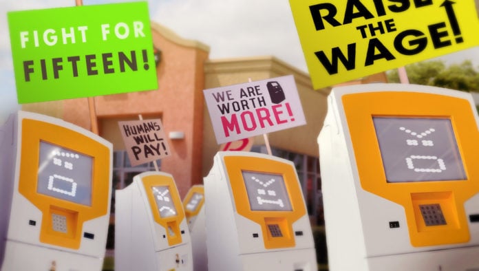 Uh-Oh: Self-Checkout Kiosks Across The Country Just Started Protesting For A $15 Minimum Wage