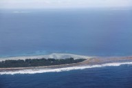 Climate migrants arrive in Australia from sinking Tuvalu in South Pacific