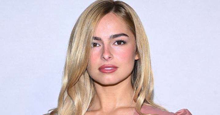 Addison Rae Is a Latex Trad Wife in Plunging Corset Dress