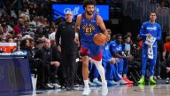 Nuggets' Jamal Murray sprains right ankle in loss to Mavericks