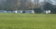 Travellers remain on popular Birmingham park a fortnight after arrival