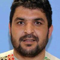 Accused National Guard shooter pleads not guilty to murder and assault charges at first court appearance from the hospital