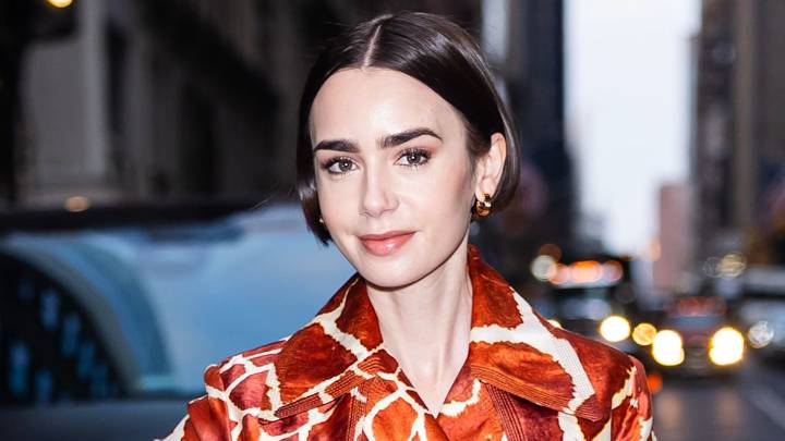 Lily Collins just made giraffe print a thing for AW25 in vintage trench coat and heels
