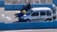 Detenido en Algeciras un conductor que circuló con un 'rider' sobre el capó