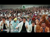 ‘Silent Night’ tradition brings quiet, costumes, and court-storming to college basketball game