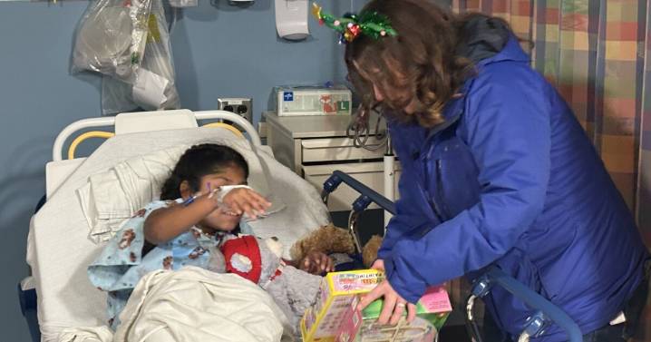 Who delivered 5,037 toys to Akron Children's Hospital?