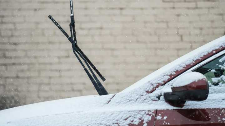 The dos and don'ts of clearing ice off your car's frozen windshield