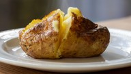 The Best Baked Potato Topping Is Simple, Flavorful, And Can Be Grown In Your Kitchen