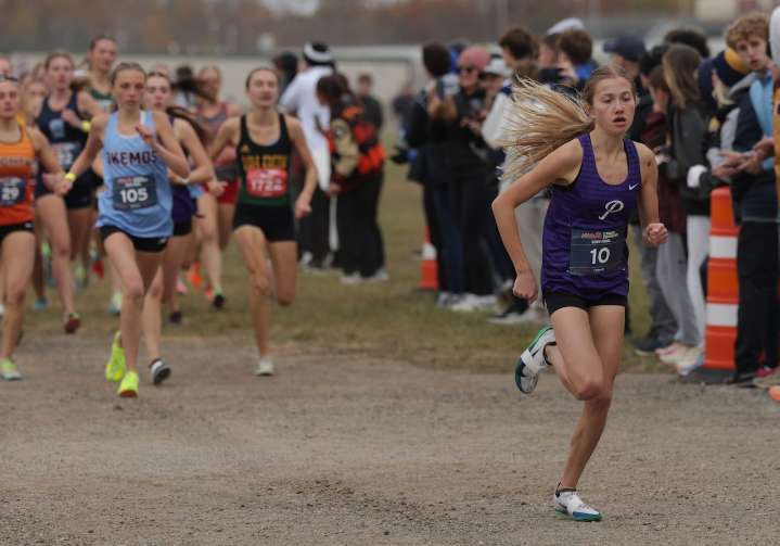 Michigan state champion cross country runner wins two national titles a week apart