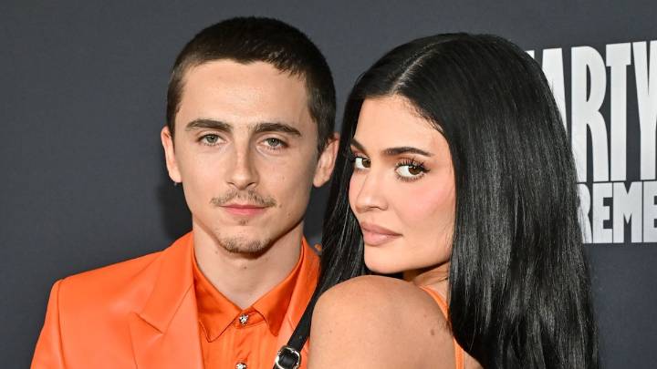 Kylie Jenner and Timothée Chalamet twin in orange leather for PDA date night