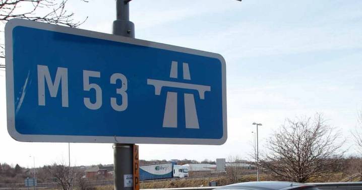 BMW overturns after colliding with barrier on M53