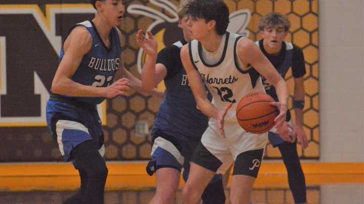 PHOTOS: Pellston, Inland Lakes clash in Ski Valley boys basketball