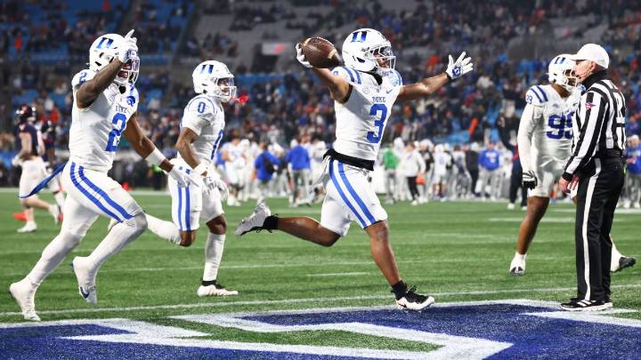Duke stirs CFP pot, defeats Virginia in OT of ACC title game