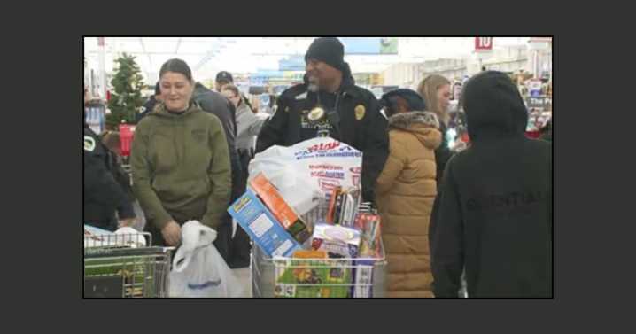 Madison police shop for toys to donate to local children for the holidays