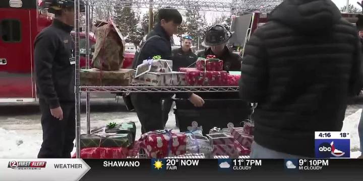 Firefighters surprise kids at HSHS St. Vincent Children’s Hospital with presents