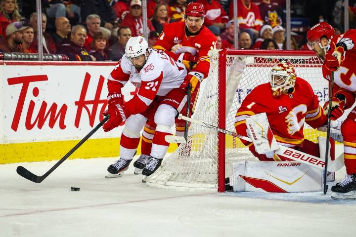 Deadspin | Wings build 4-goal cushion, hold on to edge Flames