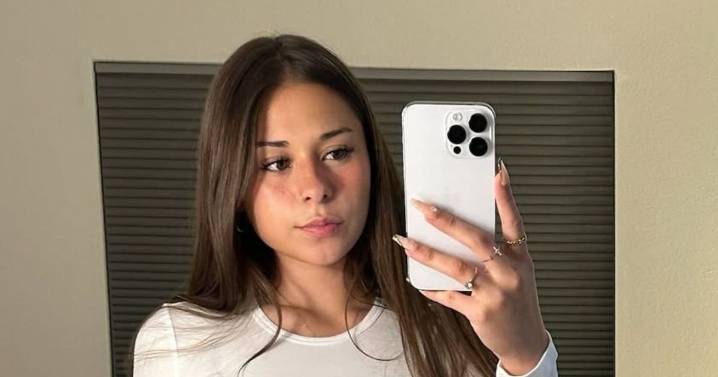 OnlyFans' Sophie Rain Turns Heads in Unzipped Bodysuit