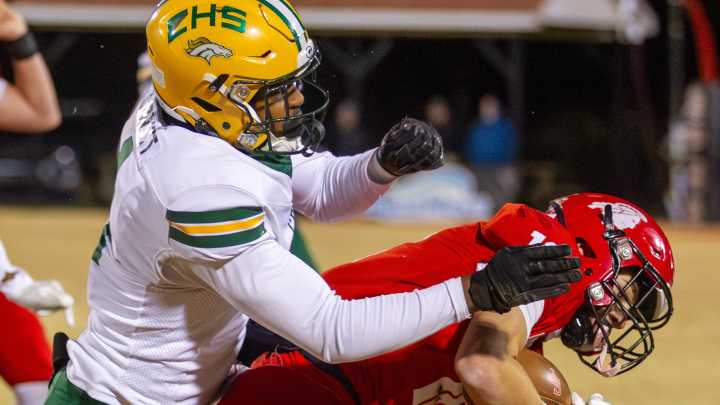 What NC high school football standouts were big steppers in Round 4?