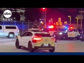 Self-driving taxi takes passenger through active police scene