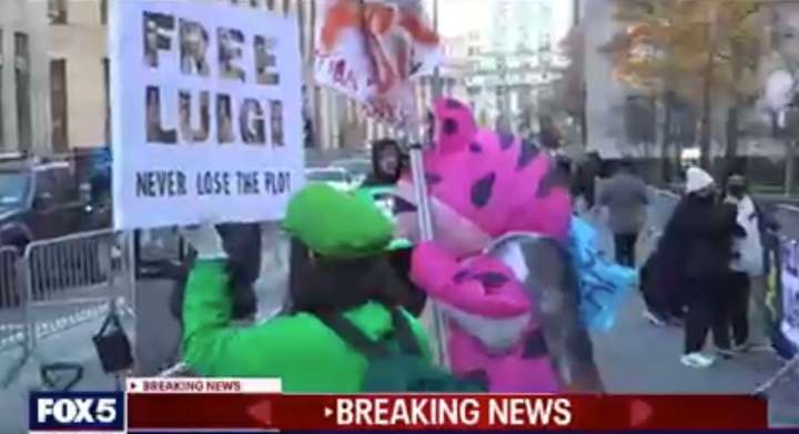 Luigi Mangione’s ‘Feverish Fans’ in Nintendo Outfits Cheer as He Enters NY Court