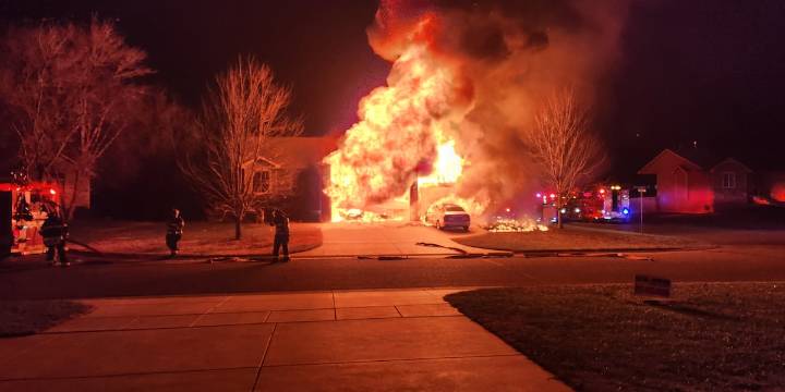 Firefighters respond to large house fire in Park City