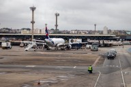 Panicked passengers evacuated after fire engulfs plane in smoke