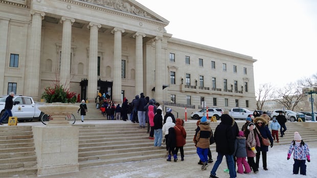 Manitobans line up in cold to meet MLAs and tour Legislature at open house event