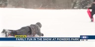 Families have fun in the snow at Pioneers Park