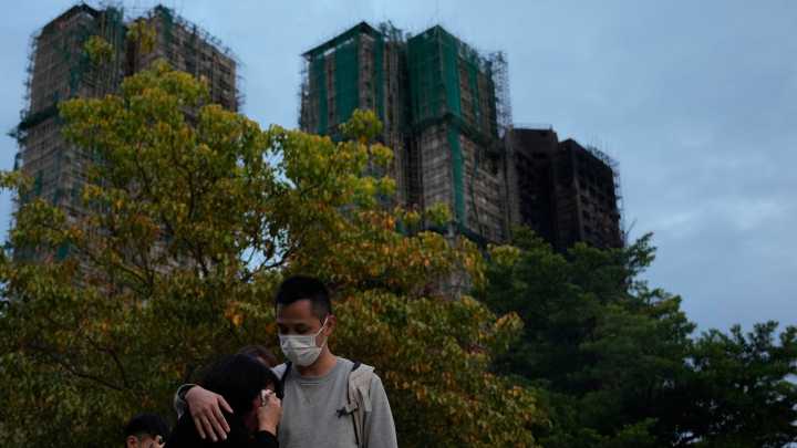 Hong Kong to form independent committee to probe cause of deadly fire as public pressure mounts