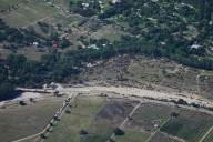 911 callers trapped in flooded attics and inundated camp cabins beg for help as floodwaters rise