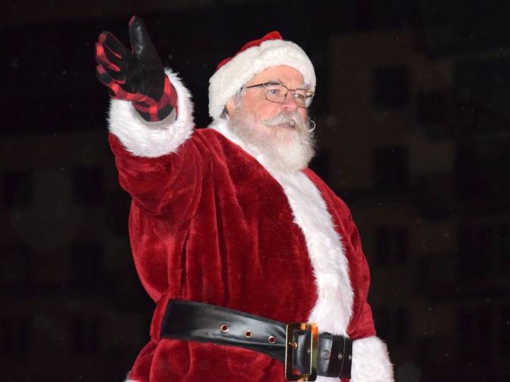 Santa Claus hits the beach in the Bend